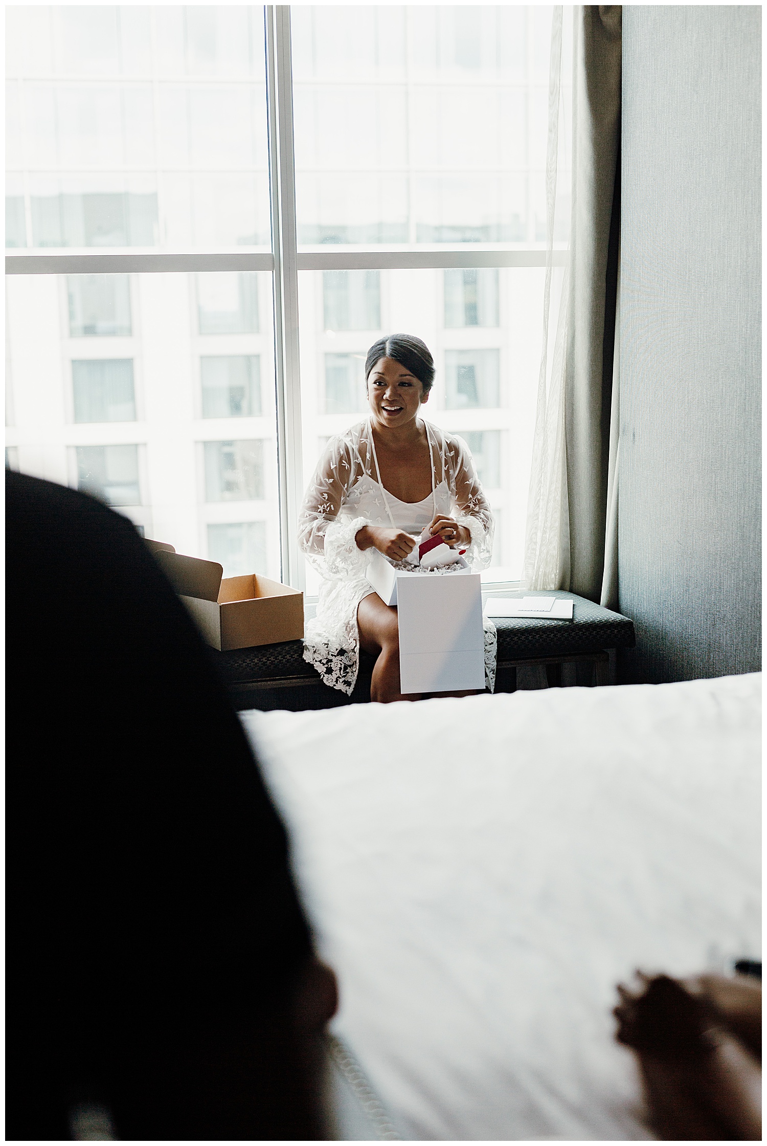 bride opening gift from groom, Nashville wedding photography, Country Music Hall of Fame wedding reception, Tennessee wedding Planning, Wedding Inspiration, Downtown Nashville