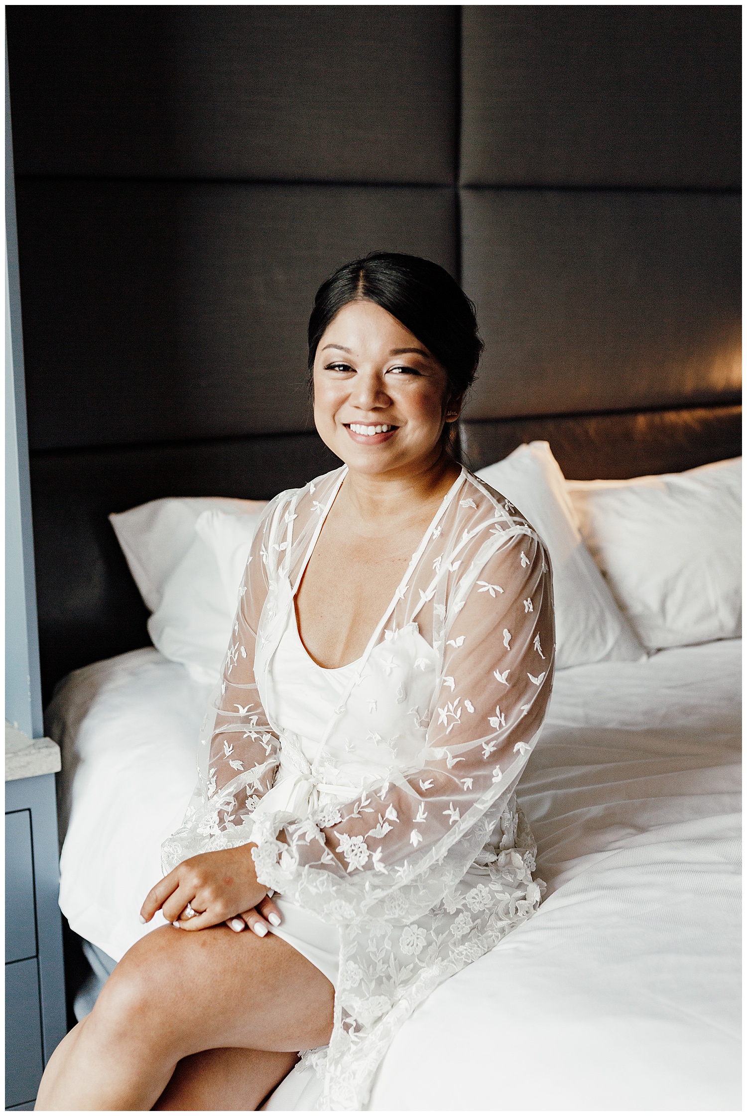 bride sitting on bed at AC hotel before putting wedding dress on, Nashville wedding photography, Country Music Hall of Fame wedding reception, Tennessee wedding Planning, Wedding Inspiration, Downtown Nashville